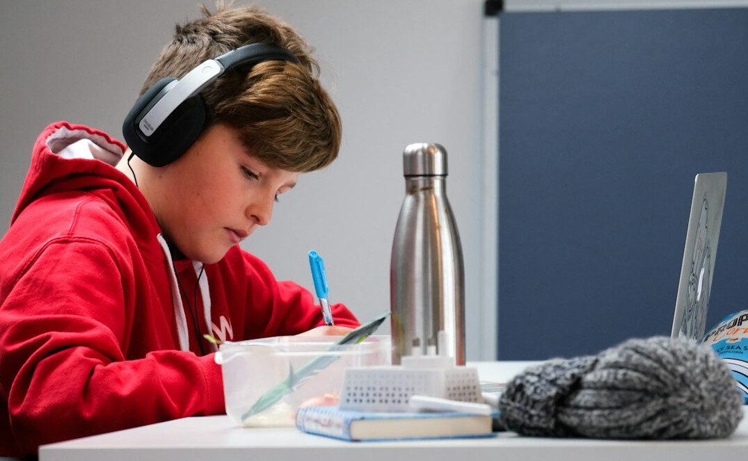 student learning coding at home