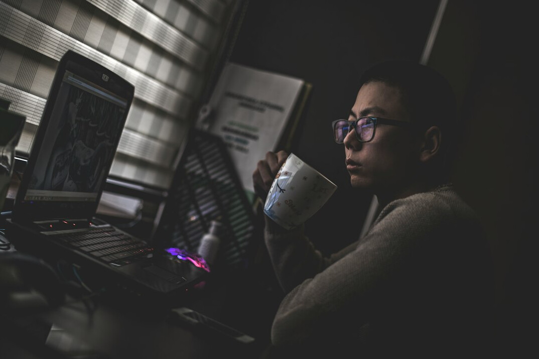 person coding at home